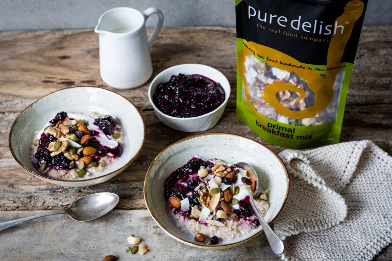 porridge with berry compote, coconut yoghurt & primal breakfast mix